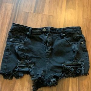 Black distressed shorts